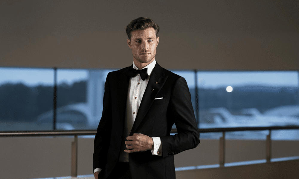 model wearing black tie dress shirt