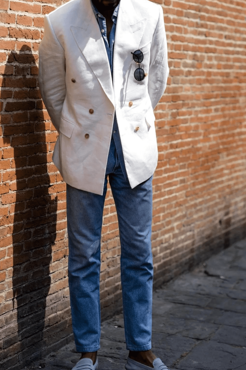 blue jeans worn with blazer