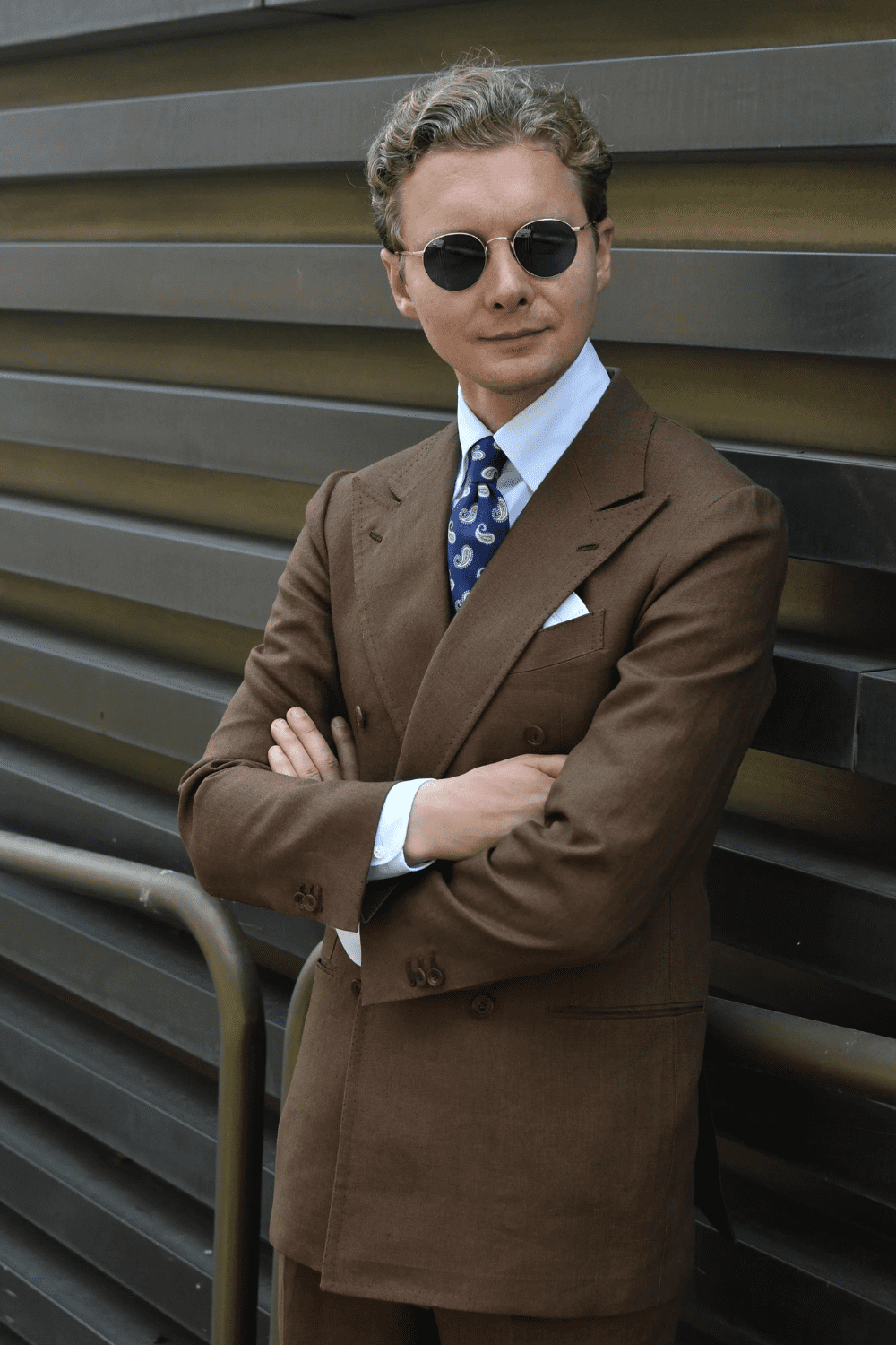 brown suit at pitti