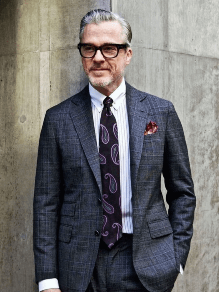 bold tie pattern with suit
